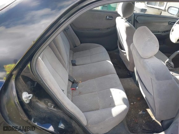 2000 Mazda 626 LX with VIN 1YVGF22CXY5123930, listed as a IAAI auction lot 40712369 with 210,234 mi miles. Bid and sale history available at carsss.com. Image 8.