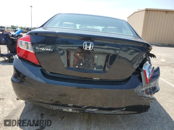 2012 Honda Civic LX z VIN 19XFB2F50CE051626, wystawiony jako Copart lot #59477235 z przebiegiem 126 225 mil mil oraz Szkoda całkowita • Salvage title. Historia ofert i sprzedaży dostępna na DreamBid. Obrazek 6.