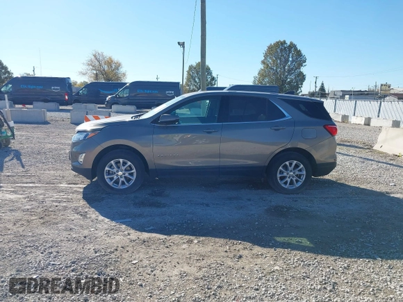 2018 Chevrolet Equinox LT z VIN 3GNAXSEV7JS621706, wystawiony jako IAAI lot #40760827 z przebiegiem 36 051 mil mil oraz . Historia ofert i sprzedaży dostępna na DreamBid. Obrazek 14.