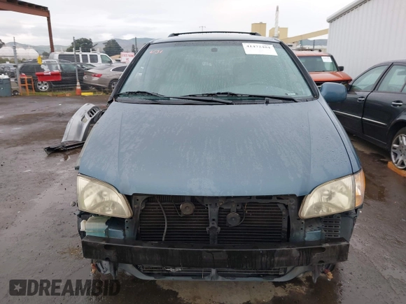 2001 Toyota Sienna LE with VIN 4T3ZF13C01U323995, listed as a IAAI auction lot 41472484 with 232,667 mi miles. Bid and sale history available at carsss.com. Image 13.