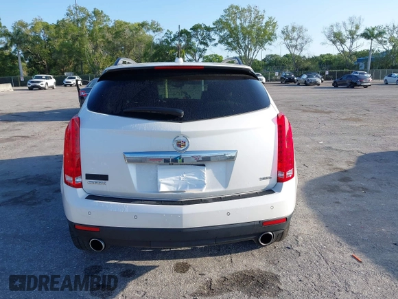 2015 Cadillac SRX Premium Collection with VIN 3GYFNDE32FS530357, listed as a IAAI auction lot 41976585 with 92,335 mi miles and . Bid and sale history available at carsss.com. Image 16.