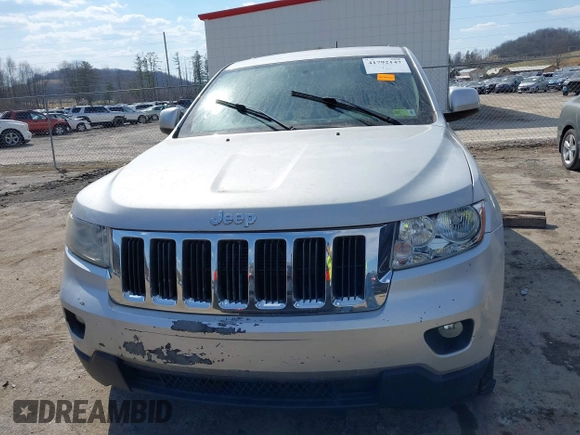 2013 Jeep Grand Cherokee Laredo with VIN 1C4RJFAG5DC634685, listed as a IAAI auction lot 41792147 with 260,594 mi miles. Bid and sale history available at carsss.com. Image 12.