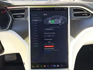 2017 Tesla Model S 100D with VIN 5YJSA1E22HF210635, listed as a IAAI auction lot 41854125 with 112,323 mi miles. Bid and sale history available at carsss.com. Image 18.