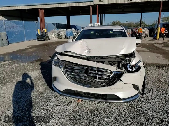 2017 Mazda CX-9 Grand Touring z VIN JM3TCADYXH0127867, wystawiony jako Copart lot #82352204 z przebiegiem 129 349 mil mil oraz Szkoda całkowita • Salvage title. Historia ofert i sprzedaży dostępna na DreamBid. Obrazek 14.