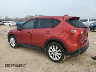 2013 Mazda CX-5 Grand Touring with VIN JM3KE2DE7D0129703, listed as a Copart auction lot 46620955 with 124,228 mi miles and Salvage Title. Bid and sale history available at carsss.com. Image 2.