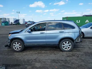 2009 Honda CR-V EX-L with VIN 5J6RE48799L065209, listed as a IAAI auction lot 41868398 with 111,385 mi miles. Bid and sale history available at carsss.com. Image 14.