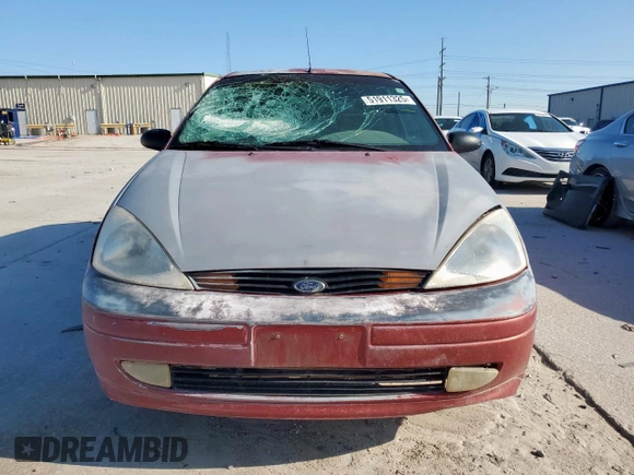 2000 Ford Focus ZX3 with VIN 3FAFP313XYR101516, listed as a Copart auction lot 51911325 with 180,653 mi miles and Salvage title. Bid and sale history available at DreamBid. Image 5.