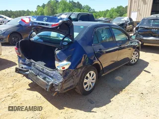 2013 Toyota Corolla L with VIN 5YFBU4EE7DP134542, listed as a IAAI auction lot 42124149 with 135,868 mi miles and . Bid and sale history available at DreamBid. Image 4.