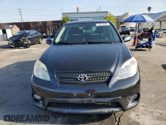 2005 Toyota Matrix STD with VIN 2T1KR32E35C395488, listed as a Copart auction lot 55072095 with 141,096 mi miles and Salvage Title. Bid and sale history available at DreamBid. Image 5.