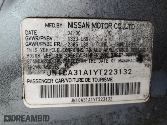 2000 Nissan Maxima GXE with VIN JN1CA31A1YT223132, listed as a Copart auction lot 60148655 with 269,258 mi miles and Salvage title. Bid and sale history available at DreamBid. Image 12.