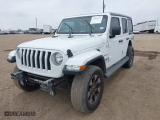 2018 Jeep Wrangler Unlimited Sahara with VIN 1C4HJXEG3JW207429, listed as a IAAI auction lot 41509257 with 121,596 mi miles. Bid and sale history available at carsss.com. Image 17.