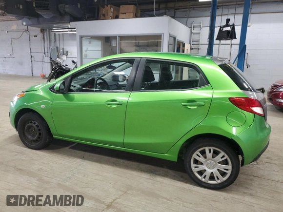 2012 Mazda 2 Sport with VIN JM1DE1KY9C0151578, listed as a Copart auction lot 52625055 with 123,812 mi miles and Salvage Title. Bid and sale history available at DreamBid. Image 2.