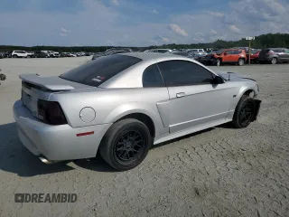 2003 Ford Mustang GT Deluxe with VIN 1FAFP42X03F305514, listed as a Copart auction lot 60518195 with 171,363 mi miles and Salvage title. Bid and sale history available at DreamBid. Image 3.
