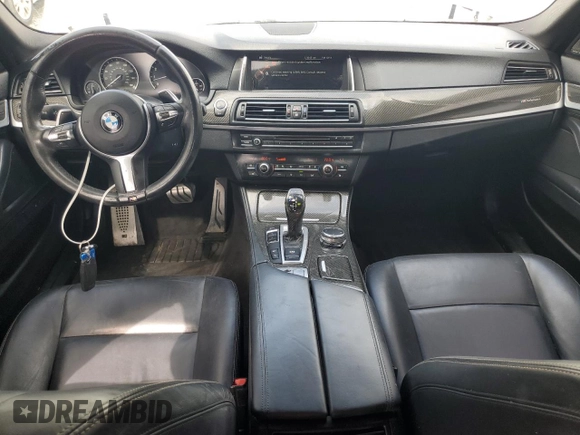 2016 BMW 5 Series 535i xDrive with VIN WBA5B3C57GG259768, listed as a Copart auction lot 63640625 with 97,584 mi miles and Salvage title. Bid and sale history available at DreamBid. Image 8.
