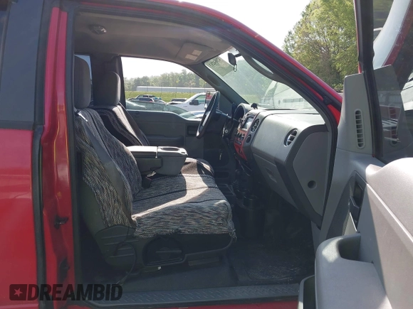 2007 Ford F-150 STX with VIN 1FTRX14W37FA65987, listed as a IAAI auction lot 42064283 with 164,730 mi miles. Bid and sale history available at carsss.com. Image 5.