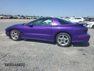 1998 Pontiac Firebird Formula z VIN 2G2FV22G3W2223937, wystawiony jako Copart lot #59905135 z przebiegiem 87 658 mil mil oraz Czysty tytuł • Clean title. Historia ofert i sprzedaży dostępna na DreamBid. Obrazek 2.