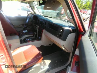 2006 Jeep Commander Limited z VIN 1J8HG58206C245740, wystawiony jako IAAI lot #42565145 z przebiegiem 90 414 mil mil oraz . Historia ofert i sprzedaży dostępna na DreamBid. Obrazek 5.