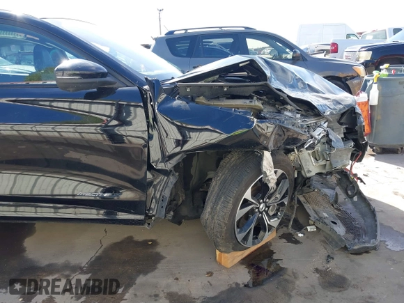 2022 Ford Mustang Mach-E Premium with VIN 3FMTK3R72NMA15608, listed as a IAAI auction lot 41824239 with 69,660 mi miles and . Bid and sale history available at DreamBid. Image 21.