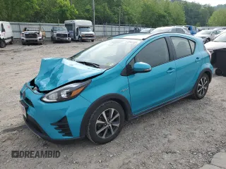 2018 Toyota Prius One z VIN JTDKDTB32J1602903, wystawiony jako Copart lot #57094185 z przebiegiem 143 053 mil mil oraz Szkoda całkowita • Salvage title. Historia ofert i sprzedaży dostępna na DreamBid. Obrazek 1.
