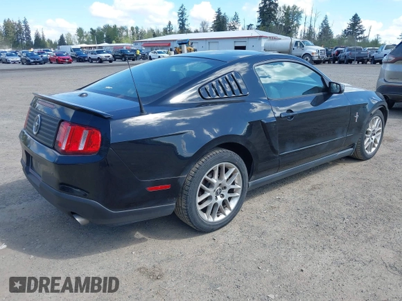 2012 Ford Mustang V6 Premium with VIN 1ZVBP8AM5C5251864, listed as a IAAI auction lot 42087587 with 171,417 mi miles. Bid and sale history available at carsss.com. Image 4.
