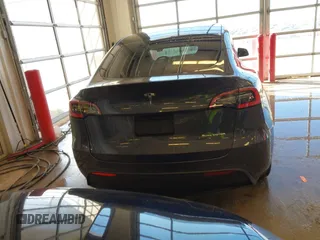 2021 Tesla Model Y Long Range with VIN 5YJYGDEE2MF087871, listed as a IAAI auction lot 41370004 with 85,757 mi miles. Bid and sale history available at carsss.com. Image 16.