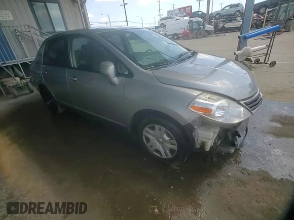 2011 Nissan Versa S with VIN 3N1BC1AP3BL404551, listed as a Copart auction lot 51977085 with 207,070 mi miles and Salvage title. Bid and sale history available at DreamBid. Image 11.