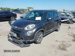 2015 FIAT 500L Urbana Trekking с VIN ZFBCFADHXFZ033368, выставлен на аукционе IAAI как лот 41979375 с пробегом 87 583 миль миль и . История ставок и продаж доступна на DreamBid. Изображение 2.
