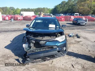 2018 Toyota RAV4 XLE with VIN JTMWFREV5JJ739619, listed as a IAAI auction lot 42017343 with 126,810 mi miles and . Bid and sale history available at DreamBid. Image 13.