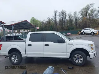 2015 Ford F-150 XLT with VIN 1FTEW1E80FFB30827, listed as a IAAI auction lot 41961072 with 155,206 mi miles and . Bid and sale history available at DreamBid. Image 13.