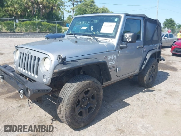 2014 Jeep Wrangler Sport with VIN 1C4AJWAG0EL126459, listed as a IAAI auction lot 42286803 with 179,025 mi miles and . Bid and sale history available at DreamBid. Image 2.