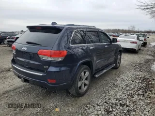 2014 Jeep Grand Cherokee Overland with VIN 1C4RJFCT2EC146306, listed as a Copart auction lot 51469995 with 150,849 mi miles and Salvage Title. Bid and sale history available at DreamBid. Image 3.
