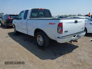 2000 Ford F-150 XL with VIN 1FTRX17L2YNA03263, listed as a IAAI auction lot 42326528 with Not provided miles and . Bid and sale history available at DreamBid. Image 3.