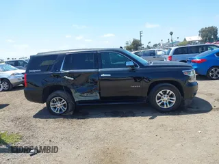 2015 Chevrolet Tahoe LT with VIN 1GNSCBKC8FR612607, listed as a IAAI auction lot 42099907 with 138,037 mi miles and . Bid and sale history available at DreamBid. Image 13.