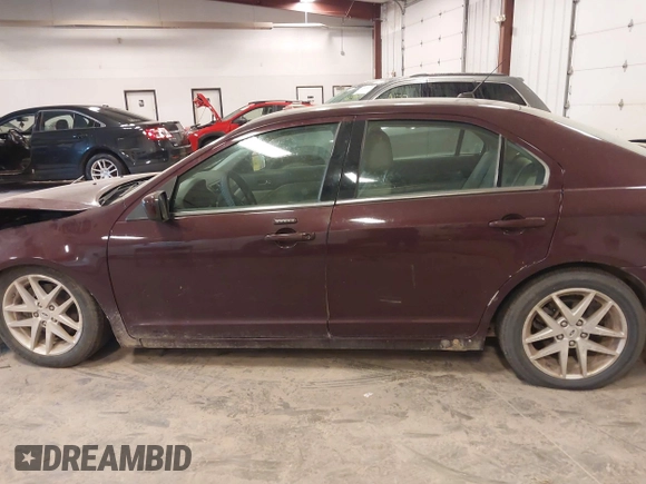 2012 Ford Fusion SEL z VIN 3FAHP0JAXCR268859, wystawiony jako IAAI lot #42319861 z przebiegiem 158 252 mil mil oraz . Historia ofert i sprzedaży dostępna na DreamBid. Obrazek 15.