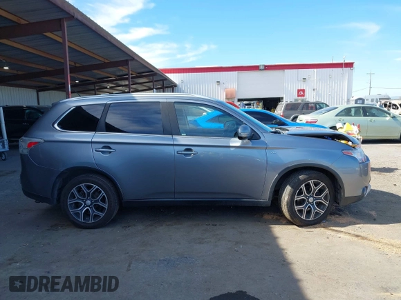 2015 Mitsubishi Outlander GT with VIN JA4JZ4AX1FZ005879, listed as a IAAI auction lot 41701299 with 212,805 mi miles and . Bid and sale history available at DreamBid. Image 13.