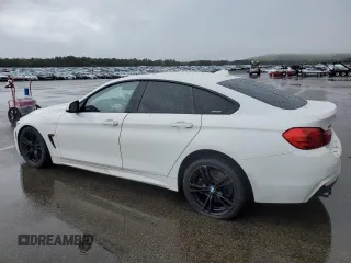 2016 BMW 4 Series 428i xDrive with VIN WBA4C9C58GG136718, listed as a Copart auction lot 55225815 with 169,356 mi miles and Salvage title. Bid and sale history available at DreamBid. Image 2.