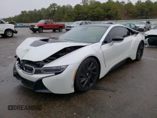 2016 BMW i8 z VIN WBY2Z2C52GV675619, wystawiony jako Copart lot #39725842 z przebiegiem 7047 mil mil oraz . Historia ofert i sprzedaży dostępna na DreamBid. Obrazek 2.