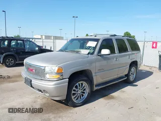 2005 GMC Yukon Denali z VIN 1GKEK63U55J266766, wystawiony jako IAAI lot #42430195 z przebiegiem Nie podano mil oraz . Historia ofert i sprzedaży dostępna na DreamBid. Obrazek 2.