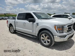 2021 Ford F-150 XL with VIN 1FTEW1CP2MKE62928, listed as a Copart auction lot 59882525 with 32,481 mi miles and Salvage title. Bid and sale history available at DreamBid. Image 4.