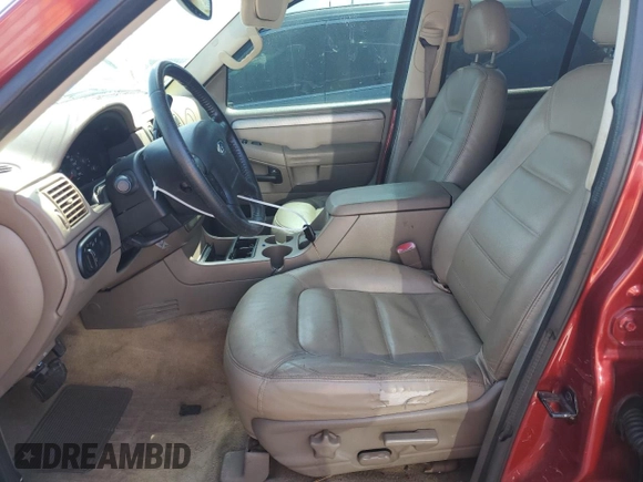 2004 Ford Explorer XLT with VIN 1FMZU73K24UB07921, listed as a Copart auction lot 55322585 with 117,293 mi miles and Salvage title. Bid and sale history available at DreamBid. Image 7.