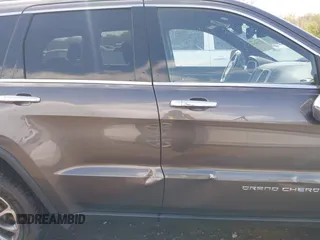 2014 Jeep Grand Cherokee Limited with VIN 1C4RJFBT4EC349957, listed as a IAAI auction lot 42118241 with 127,168 mi miles and . Bid and sale history available at DreamBid. Image 14.