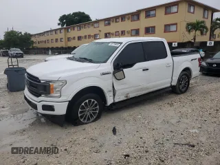 2018 Ford F-150 XL with VIN 1FTEW1CP6JKD50225, listed as a Copart auction lot 59179605 with 105,602 mi miles and Salvage title. Bid and sale history available at DreamBid. Image 1.