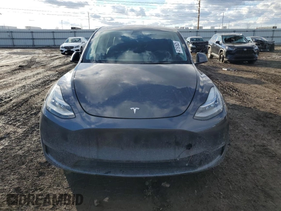 2022 Tesla Model Y Long Range with VIN 7SAYGDEE7NF386082, listed as a Copart auction lot 47191625 with 73,634 mi miles and Salvage Title. Bid and sale history available at carsss.com. Image 5.