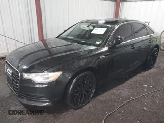 2012 Audi A6 3.0T Prestige with VIN WAUBGAFC1CN025117, listed as a IAAI auction lot 42027261 with 162,490 mi miles. Bid and sale history available at carsss.com. Image 2.