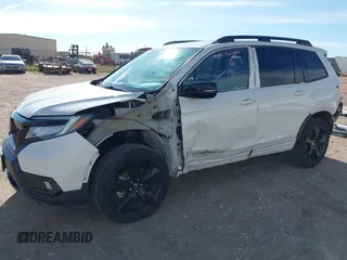 2019 Honda Passport Elite z VIN 5FNYF8H0XKB001472, wystawiony jako IAAI lot #42143890 z przebiegiem 98 119 mil mil oraz . Historia ofert i sprzedaży dostępna na DreamBid. Obrazek 6.