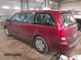 2014 Dodge Grand Caravan SE with VIN 2C4RDGBG5ER379315, listed as a IAAI auction lot 41673071 with 168,569 mi miles and . Bid and sale history available at DreamBid. Image 3.