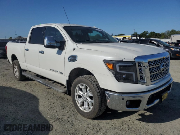 2016 Nissan Titan Platinum Reserve z VIN 1N6BA1F2XGN506613, wystawiony jako Copart lot #52592585 z przebiegiem 133 408 mil mil oraz Czysty tytuł • Clean title. Historia ofert i sprzedaży dostępna na DreamBid. Obrazek 4.