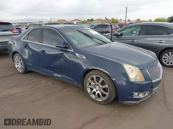 2009 Cadillac CTS RWD w/1SB with VIN 1G6DV57V690111847, listed as a IAAI auction lot 42189418 with 144,790 mi miles. Bid and sale history available at carsss.com. Image 1.