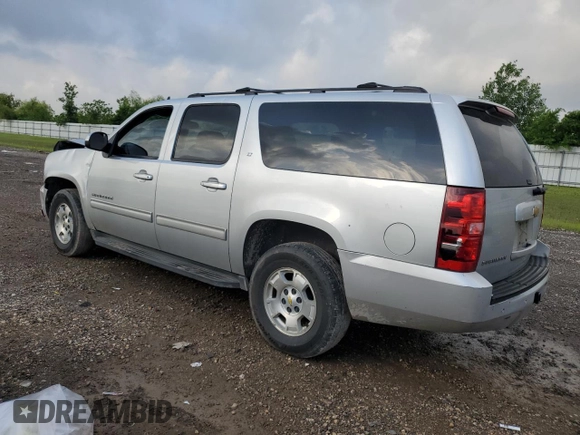 2012 Chevrolet Suburban LT z VIN 1GNSCJE01CR128642, wystawiony jako Copart lot #54210515 z przebiegiem Nie podano mil oraz Szkoda całkowita • Salvage title. Historia ofert i sprzedaży dostępna na DreamBid. Obrazek 2.