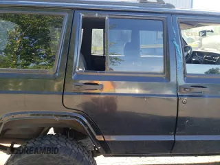 2000 Jeep Cherokee z VIN 1J4FF48S3YL180200, wystawiony jako Copart lot #55994215 z przebiegiem 209 182 mil mil oraz Szkoda całkowita • Salvage title. Historia ofert i sprzedaży dostępna na DreamBid. Obrazek 11.